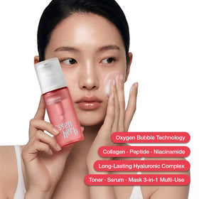 ESSENHERB essence on fingers demonstrating quick skin absorption
