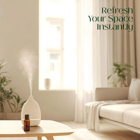 Essentially KateS glass dropper releasing measured peppermint oil for precise blending