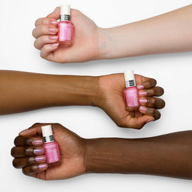 essie polished nails in hand displaying color-shift and wearable effect benefit