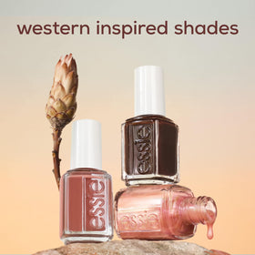 essie bottle held in hand to show product size and real-life scale