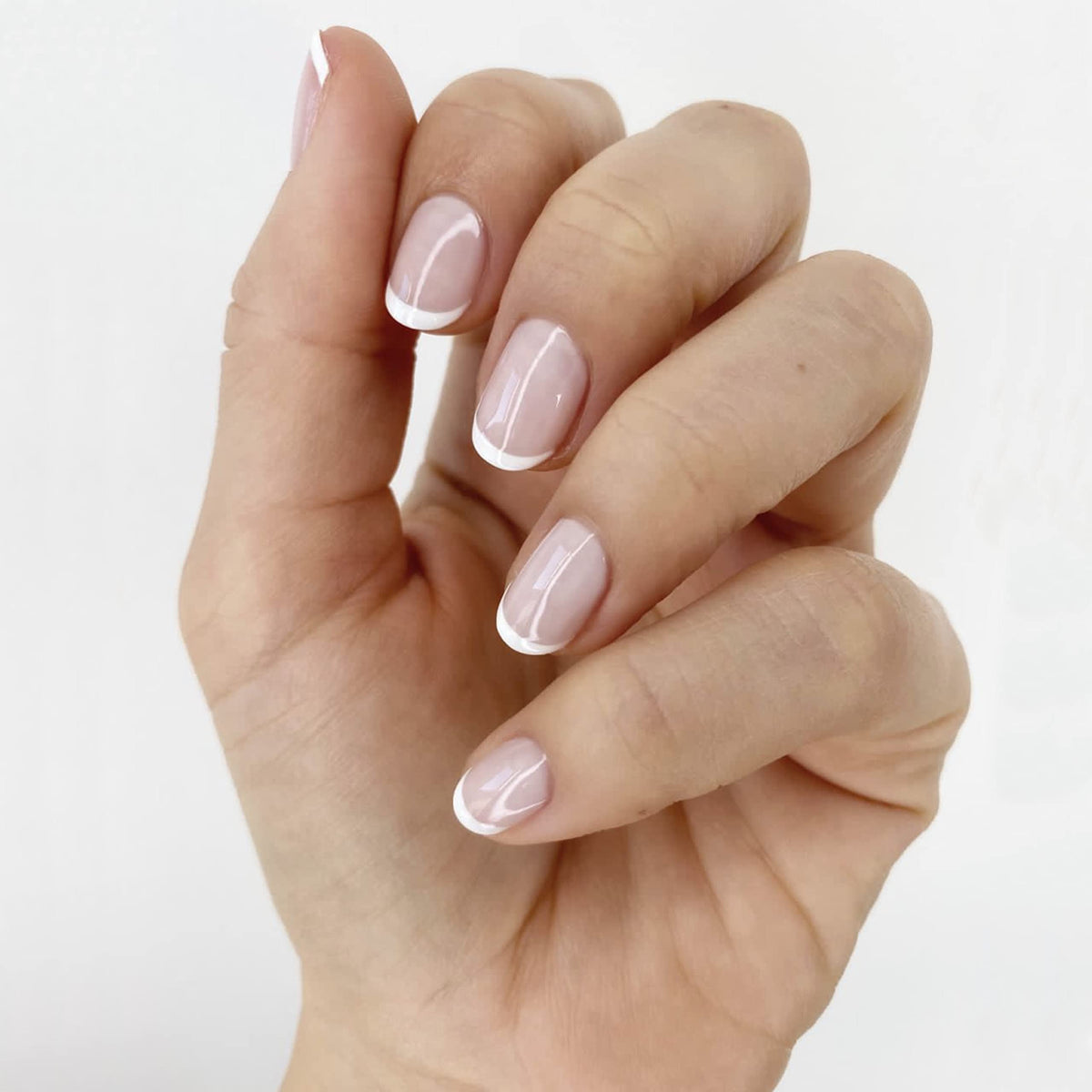essie Blanc applying clean white tip for precise smile lines and sharp contrast