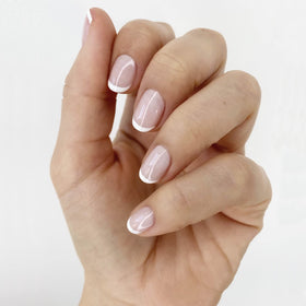essie Blanc applying clean white tip for precise smile lines and sharp contrast