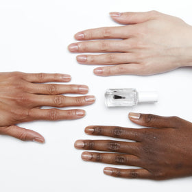 essie clear gloss nail closeup highlighting shiny finish and fast-dry benefit