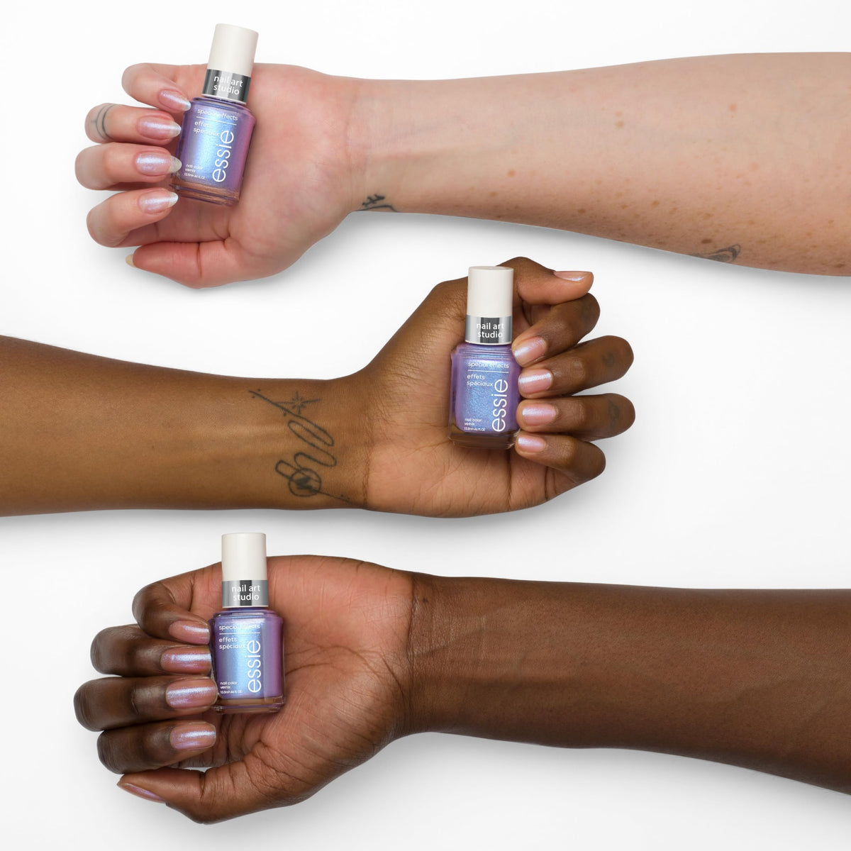 essie polished nails in studio lighting highlighting duochrome color shift