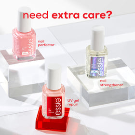 essie hand holding bottle in lifestyle setting showing easy at-home use