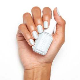 essie hand with manicure in lifestyle setting showing versatile style benefit