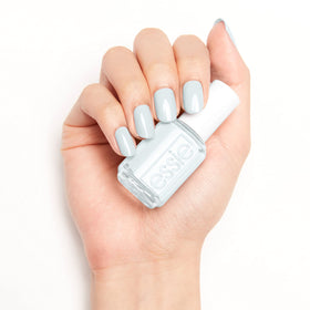 essie bottle beside ruler showing compact 0.46 fl oz size benefit