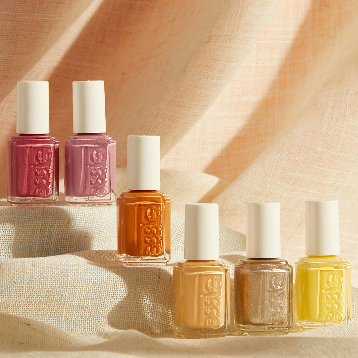 essie painted fingernails lifestyle shot showing wearable color benefit
