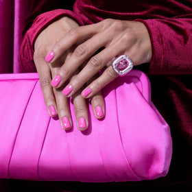 essie pinky ring swatch on nail tip showing true cream color payoff