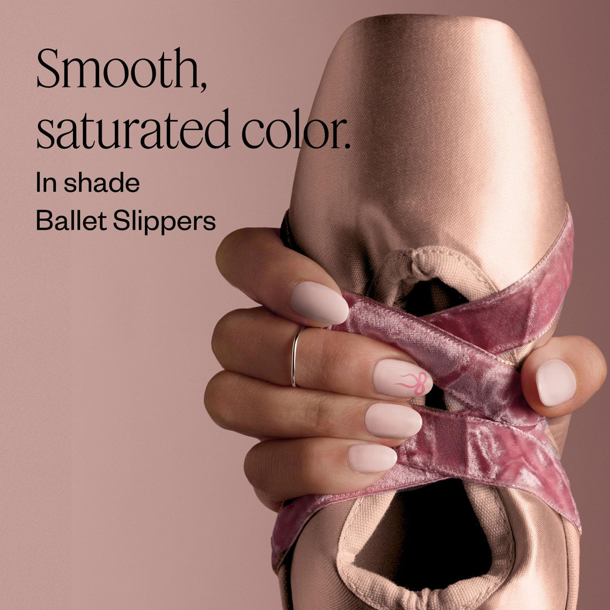 essie swatch on fingertips demonstrates two-coat opacity and salon-quality finish