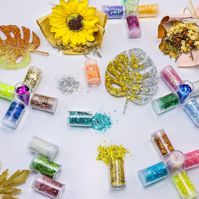 Estanoite open jar revealing mixed chunky and fine glitter for easy access