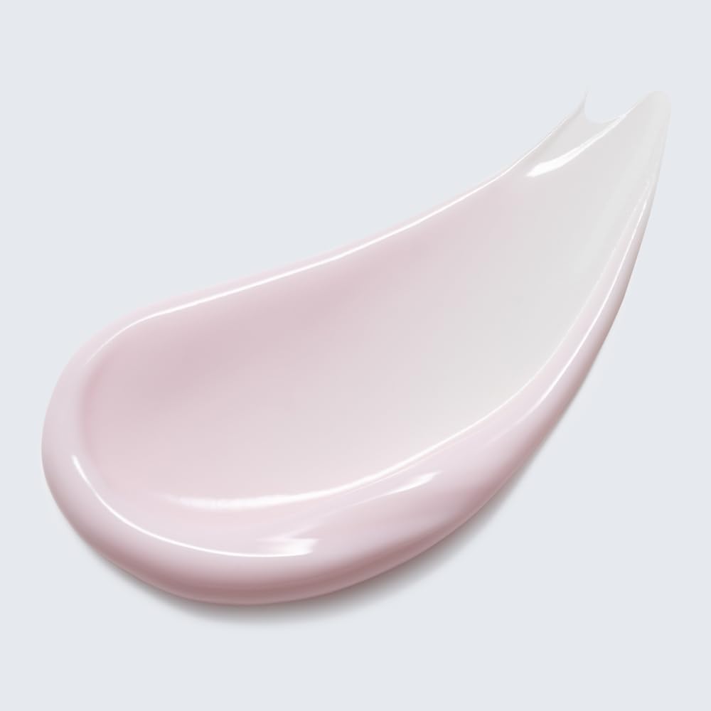 Estée Lauder lotion in bathroom setting demonstrating layering with perfume benefit