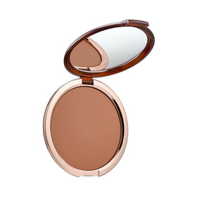 Estée Lauder front compact view showing sleek case and matte bronzer benefit: elegant portability