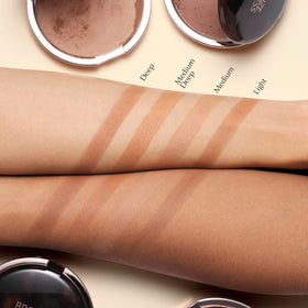 Estée Lauder swatches on skin demonstrating buildable natural color