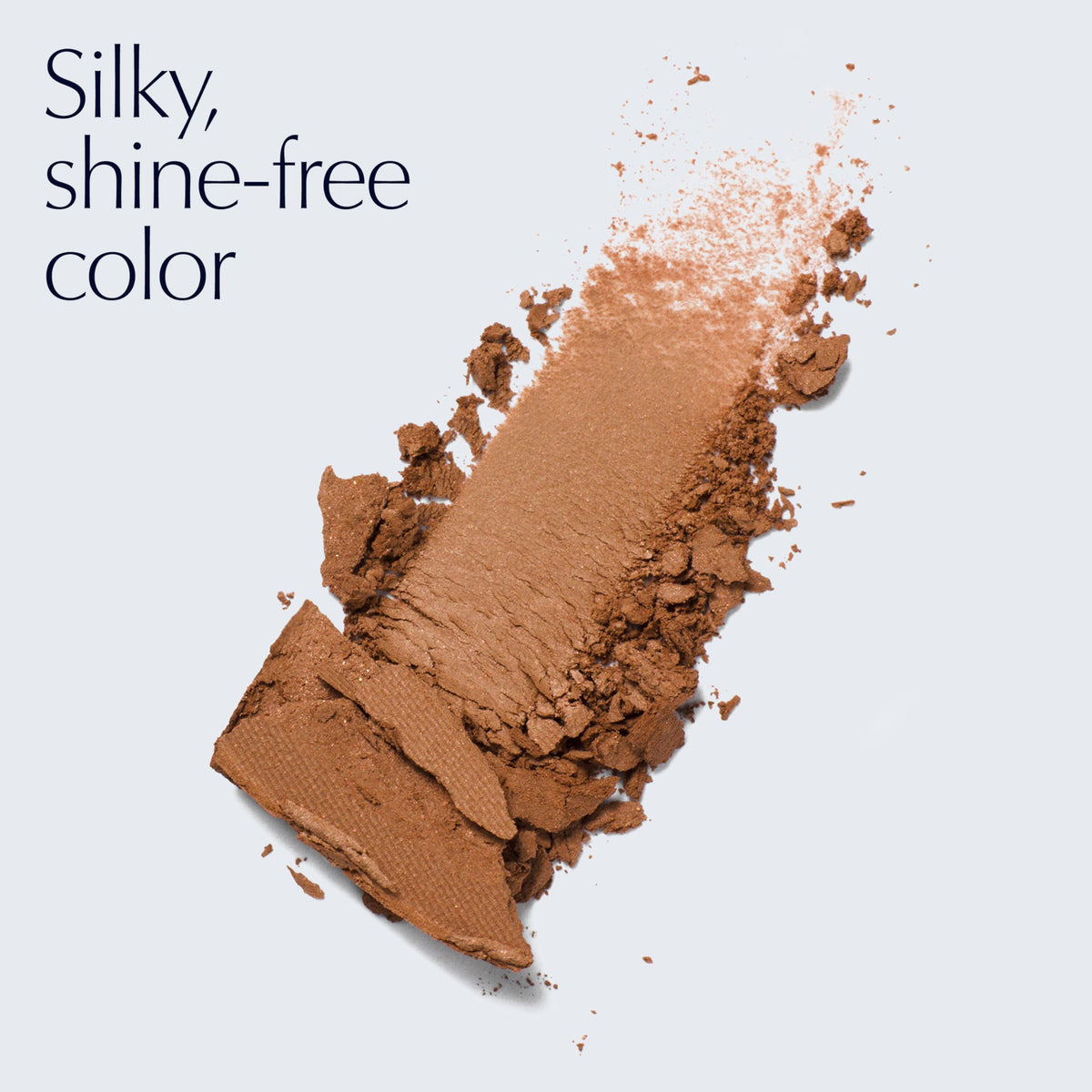 Estée Lauder close-up of bronzer texture showing finely milled matte powder benefit: smooth blendability