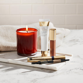 Estée Lauder spoolie brushing brows for groomed shape and blended finish
