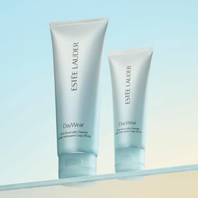 Estée Lauder cleanser pouring from dispenser demonstrating easy use
