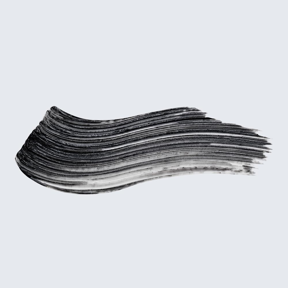Estée Lauder Little Black Primer texture close-up illustrating smooth black tint for natural definition