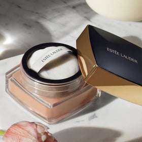 Estée Lauder powder texture close-up revealing microfine, silky finish benefit