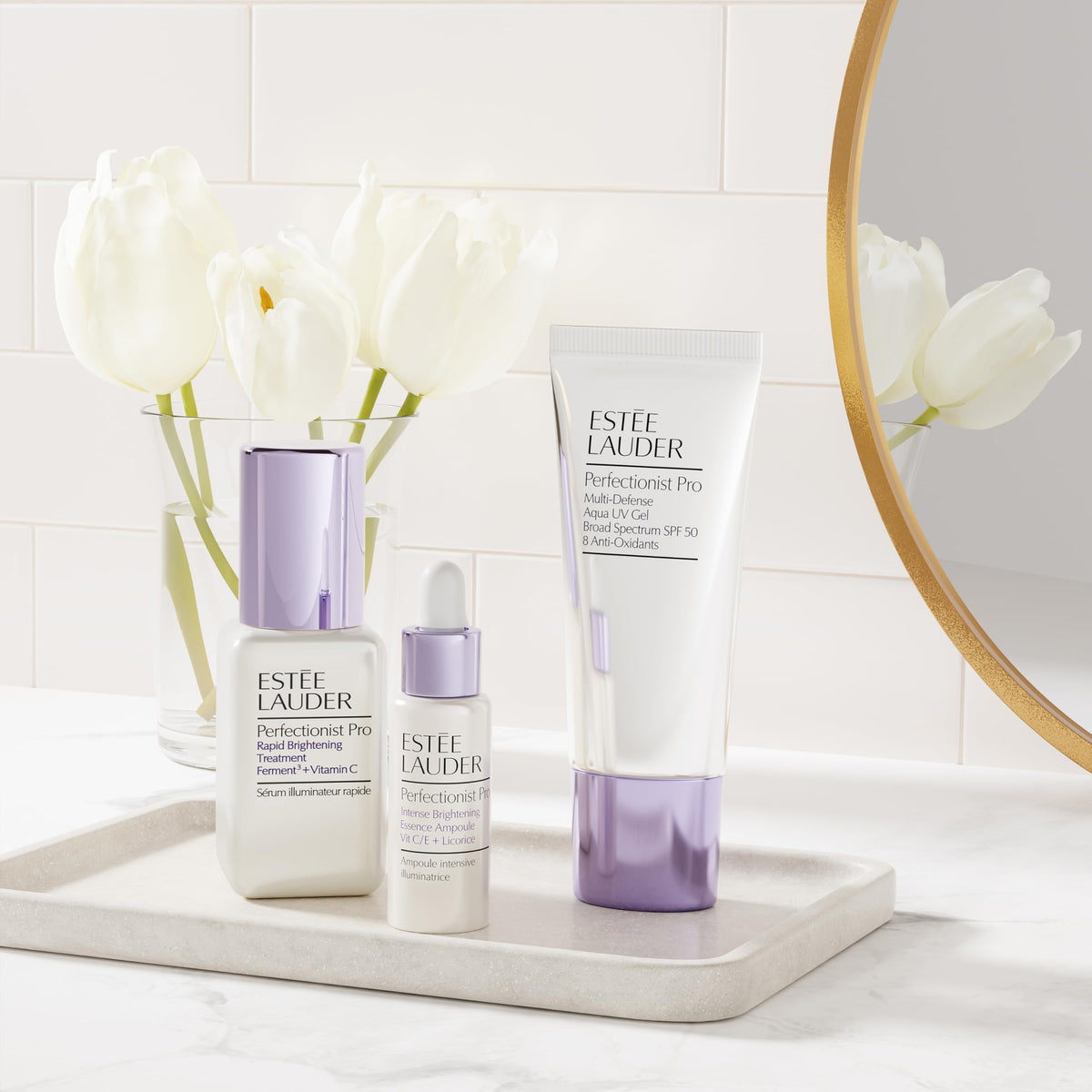 Estée Lauder product in hand applying invisible veil for quick absorption