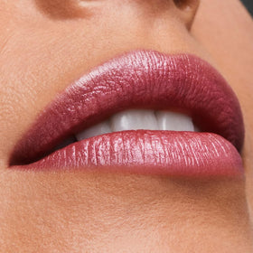 Estée Lauder swatch of 221 Pink Parfait on skin showing true shimmer and wearable color