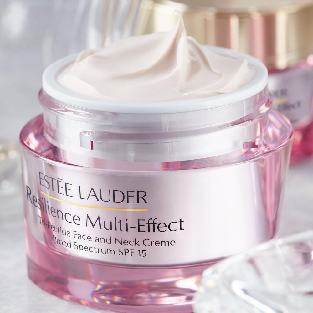 Estée Lauder application on hand spreading cream, shows fast absorption benefit