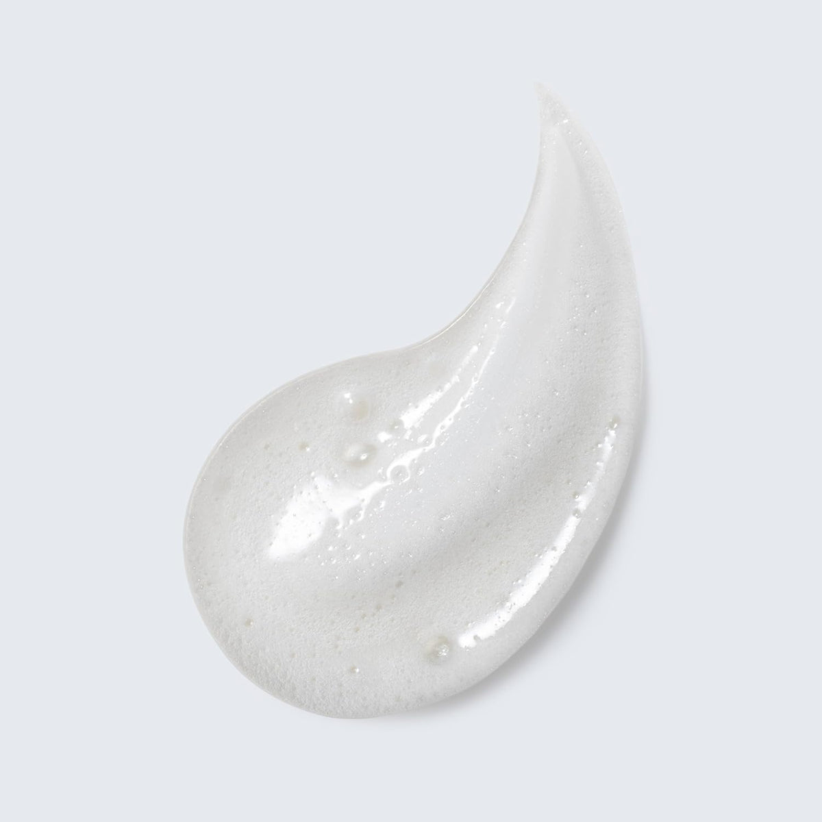 Estée Lauder creamy foam texture demonstrating gentle lather and cleansing benefit