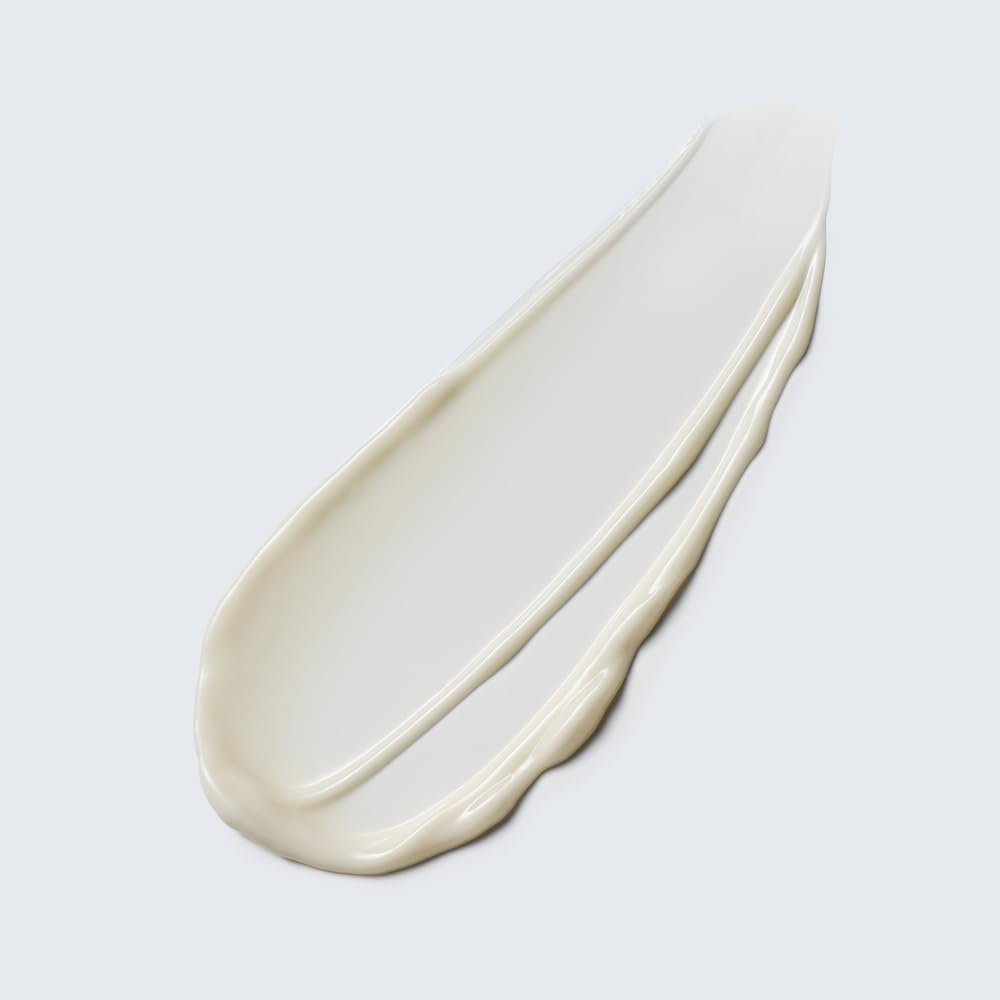Estée Lauder Youth‑Dew applied on wrist at pulse point for lasting fragrance