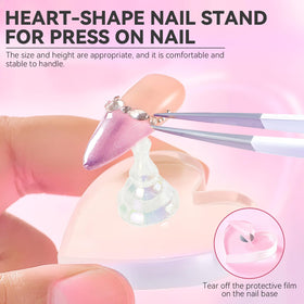 ESUOHYM heart-shaped stand close-up highlighting secure grip for detailed painting
