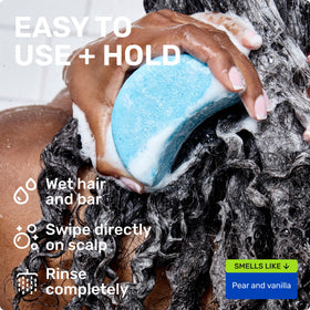 Ethique shampoo bar lathering in shower demonstrating gentle cleansing and foam
