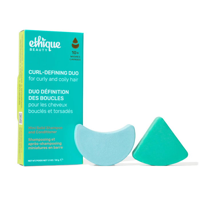 Ethique front packaging of mini curl-defining shampoo and conditioner showing travel-ready benefits