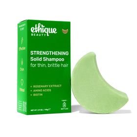Ethique packaging front view showing strengthening shampoo bar benefit