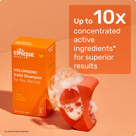 Label close-up on Ethique packaging listing biotin, caffeine, and vegan ingredients