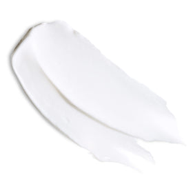 Eucerin cream on a spatula close-up showing rich emollient texture for repair