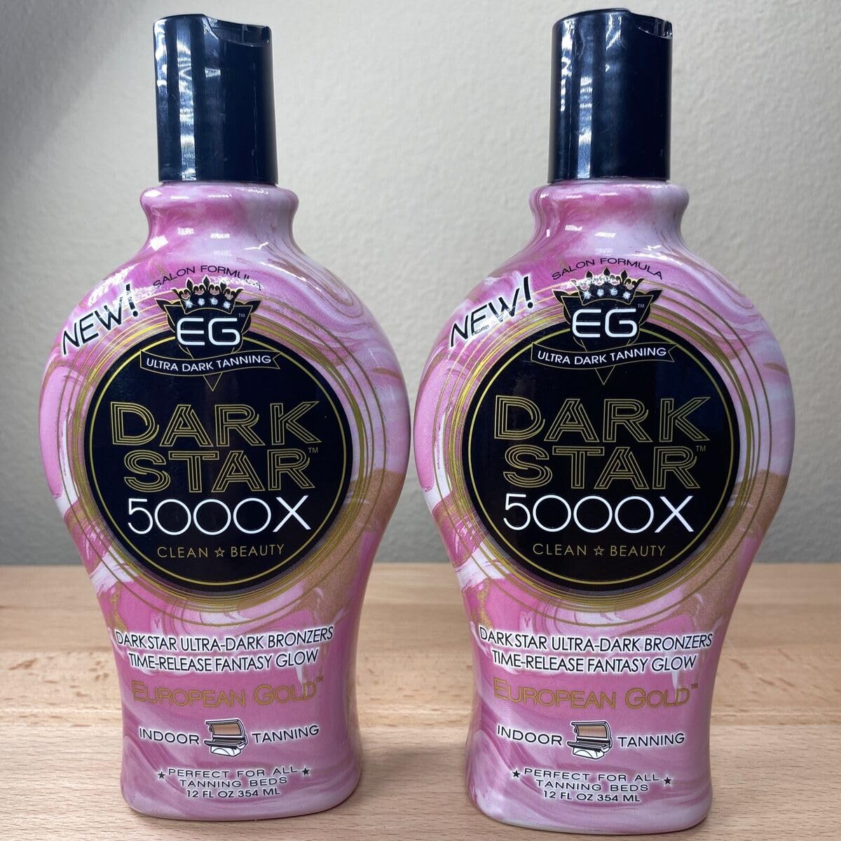 European Gold beside a hand showing 12 fl oz scale and travel‑friendly capacity