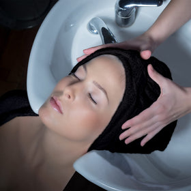 Eurow towel draped over mannequin head showing full coverage size
