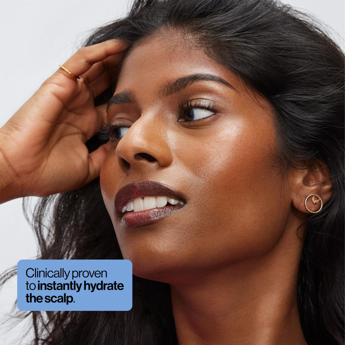 EVA·NYC dropper releasing clear serum demonstrating precise application