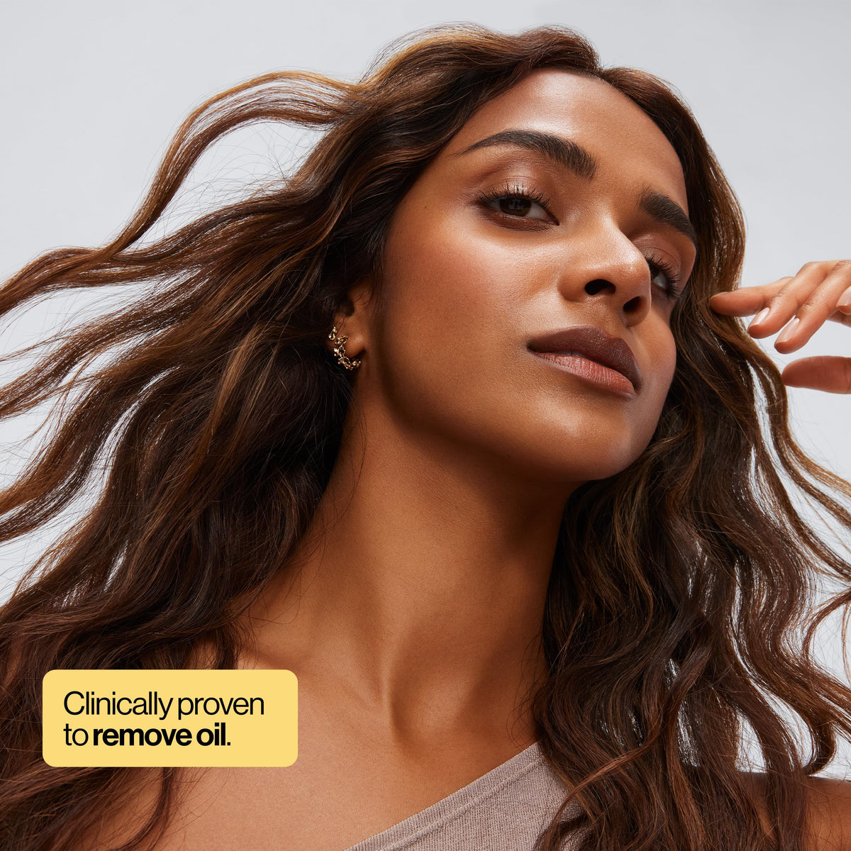 EVA·NYC dry shampoo texture close-up on palm, reveals fine rice starch powder