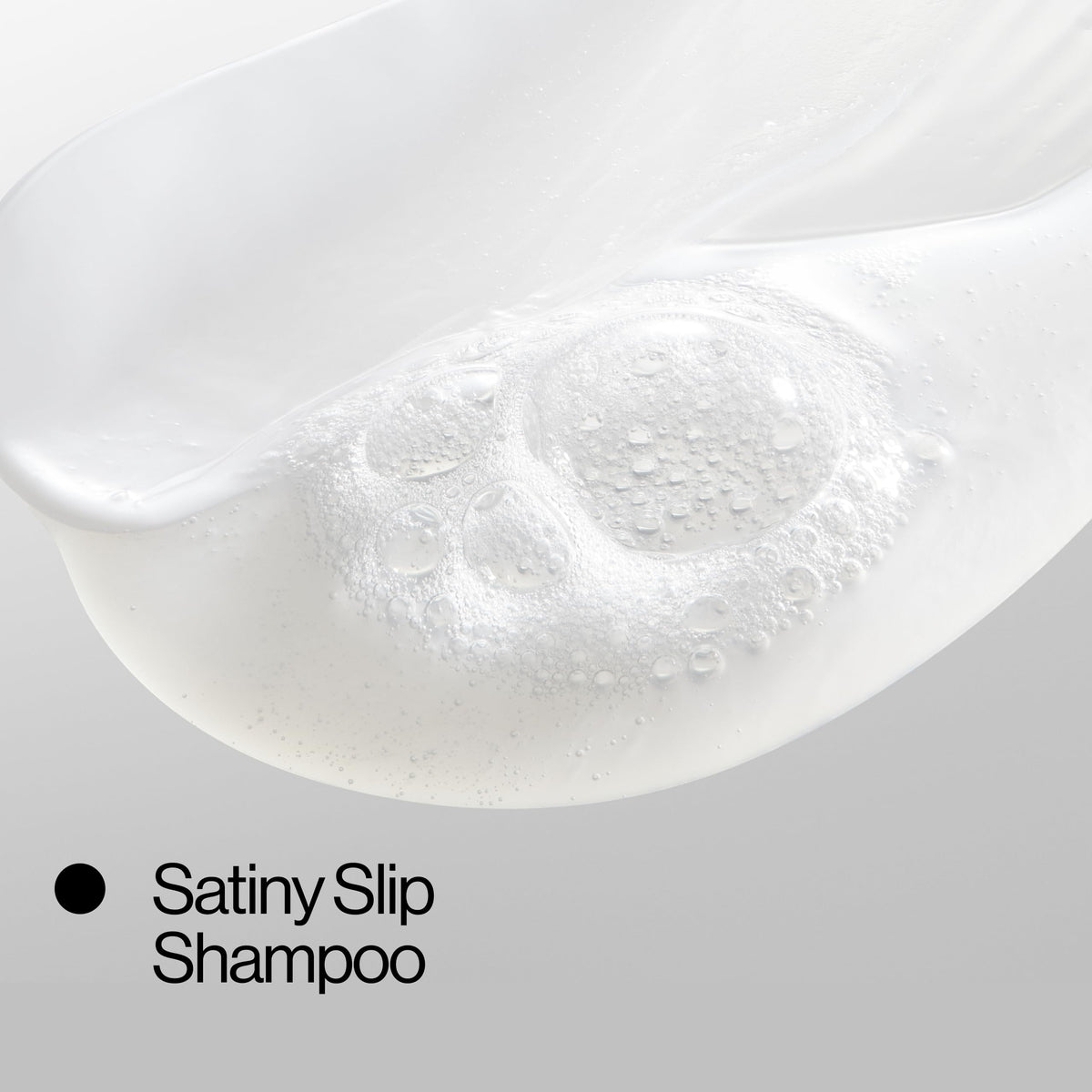 EVA·NYC in-shower lifestyle scene showing hydrated shiny hair