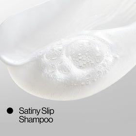 EVA·NYC in-shower lifestyle scene showing hydrated shiny hair