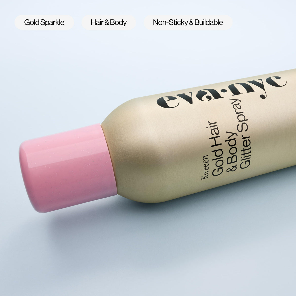 EVA·NYC glitter spray applied in styled hair adding visible gold shine and lightweight hold