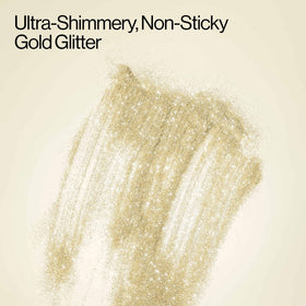 EVA·NYC spray on forearm creating radiant gold sparkle for festival-ready skin