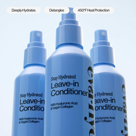 EVA·NYC being applied to damp hair mid-lengths to ends for smoother styling