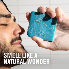 Every Man Jack bar resting on draining dish to prolong soap life