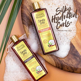 Every Strand shampoo lather on curly hair reducing buildup and frizz