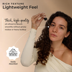 Applying Everyday Beauty Vitamin E oil as an overnight hair mask to boost shine