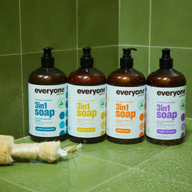 everyone for every body bottle beside everyday items showing 32 fl oz scale and economical benefit