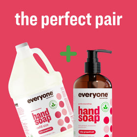 everyone ruby grapefruit gallon beside an adult hand for scale, large-size convenience benefit