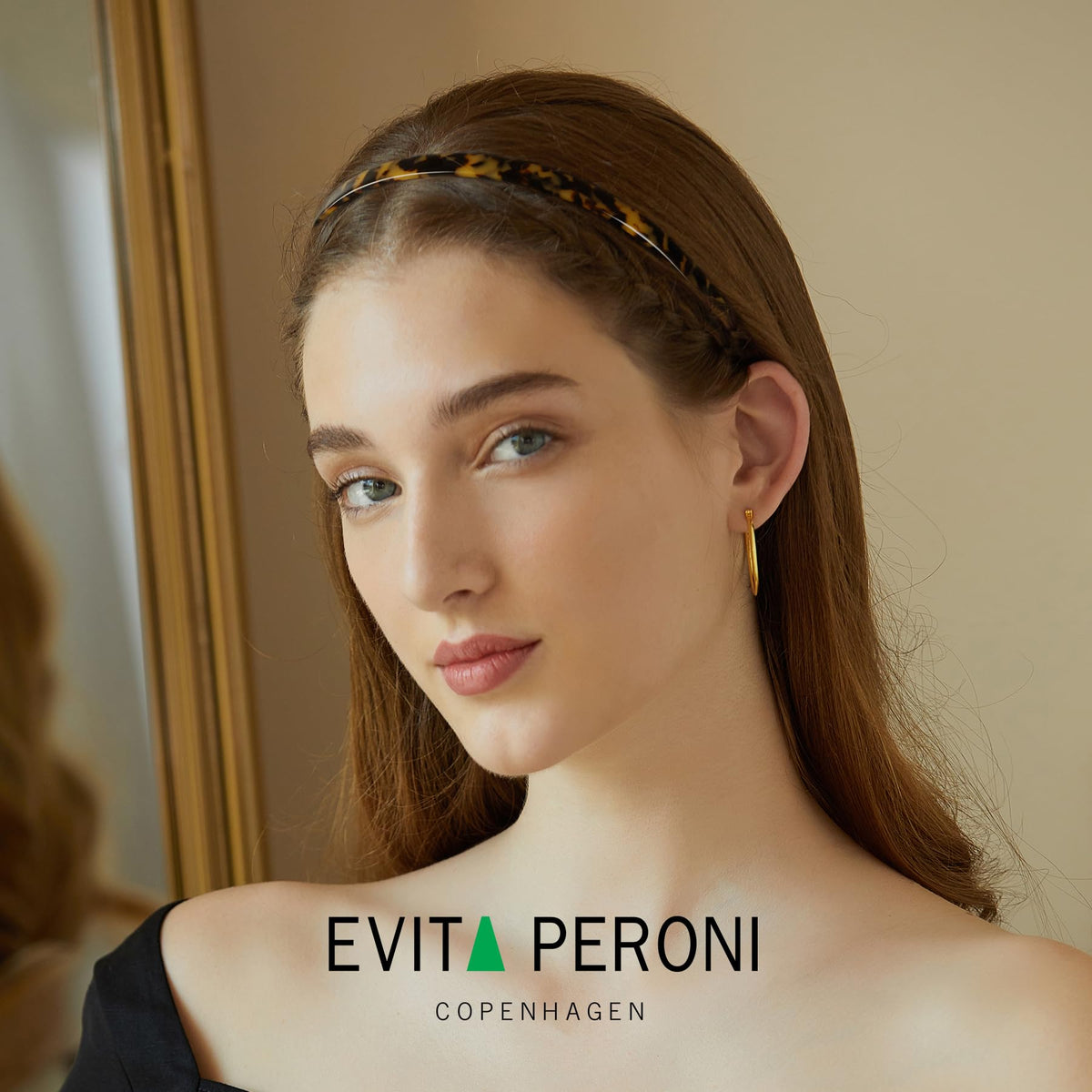 EVITA PERONI close-up of acetate texture highlighting glossy finish and flexibility