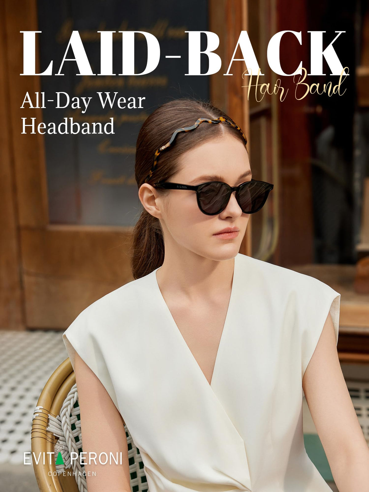 EVITA PERONI headband worn with glasses demonstrating non-slip eyewear compatibility